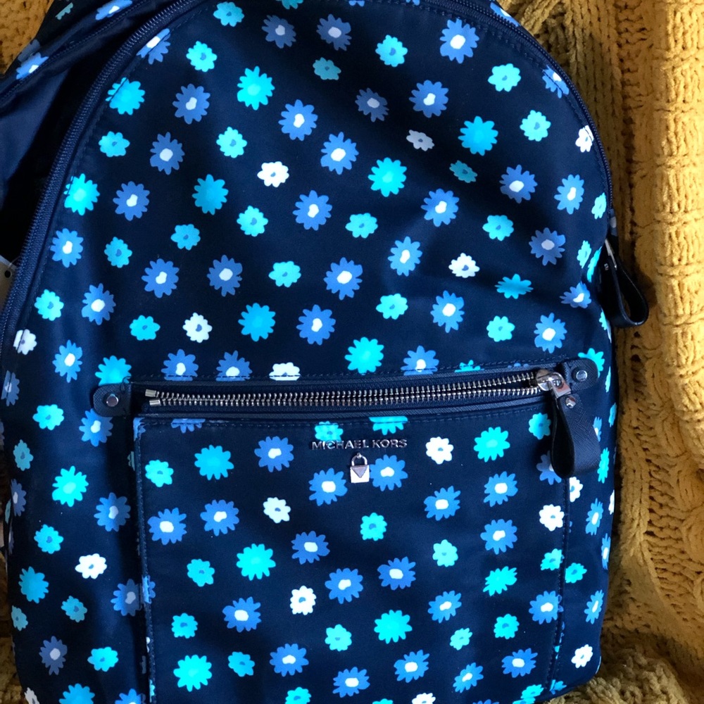 Brand new MICHAEL KORS back pack with tags